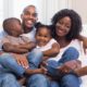 at-risk children, black youth and families: child and family support program grants; happy family on couch